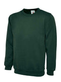 A Uneek UC201 adult unisex heavyweight sweatshirt in Bottle Green