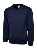 A Uneek UC206 childrens unisex classic v-neck sweatshirt in Navy