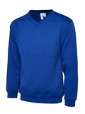 A Uneek UC206 childrens unisex classic v-neck sweatshirt in Royal
