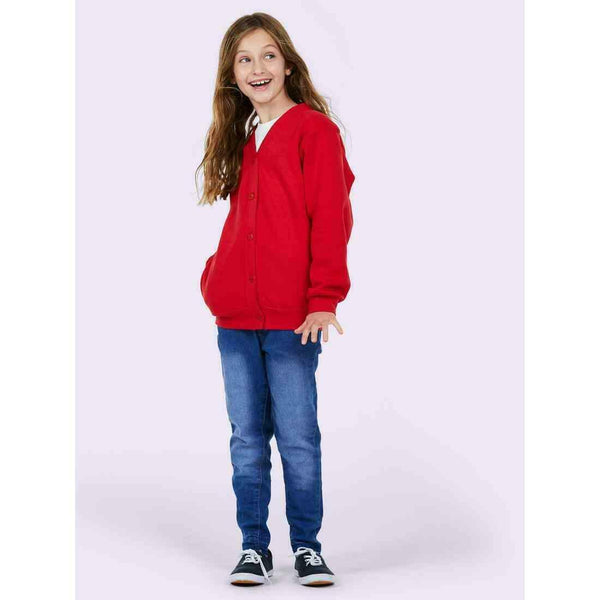 A girl wearing a UC207 Red Uneek childrens cardigan with Blue jeans