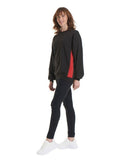 A women wearing a Uneek Two Tone Crew New Sweatshirt in Black with Red detailing