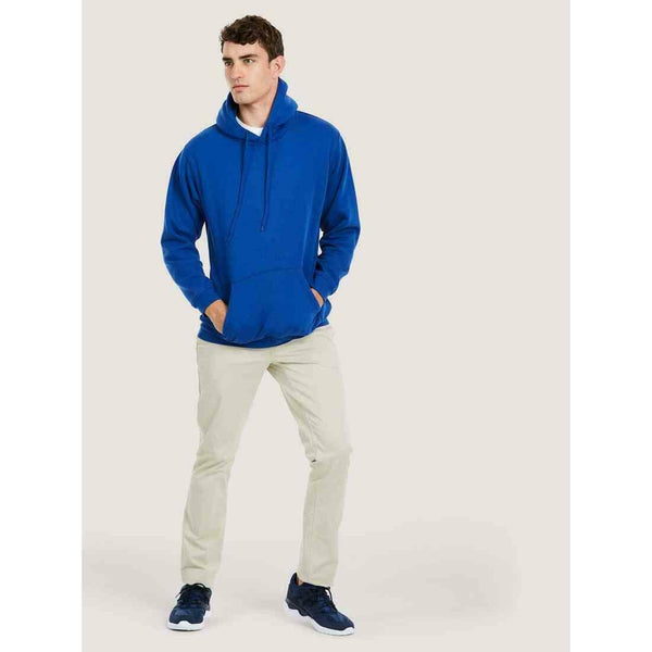 A man wearing a UC501 Royal Uneek heavyweight hoodie with Beige trousers