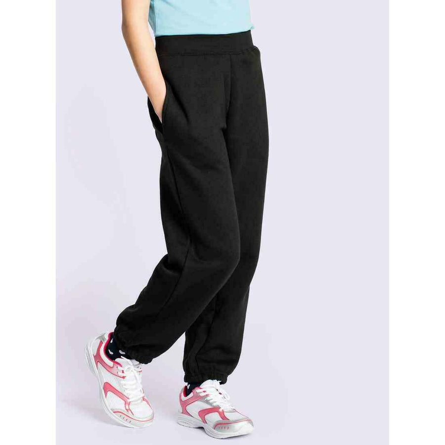 A girl wearing a UC521 Black Uneek childrens jog bottoms