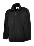 A Uneek UC602 adult unisex classic quarter-zip fleece jacket in Black