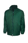 A Uneek UC605 adult unisex classic reversable fleece jacket in Bottle Green
