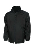A Uneek UC606 childrens unisex classic reversable fleece jacket in Black