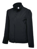 A Uneek UC612 adult unisex classic soft shell jacket in Black