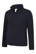 A Uneek UC613 ladies classic soft shell jacket in Navy