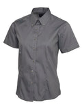 A charcoal short-sleeved Uneek UC704 button-up shirt displayed on a white background.