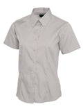 A silver grey short-sleeved Uneek UC704 button-up shirt displayed on a white background.