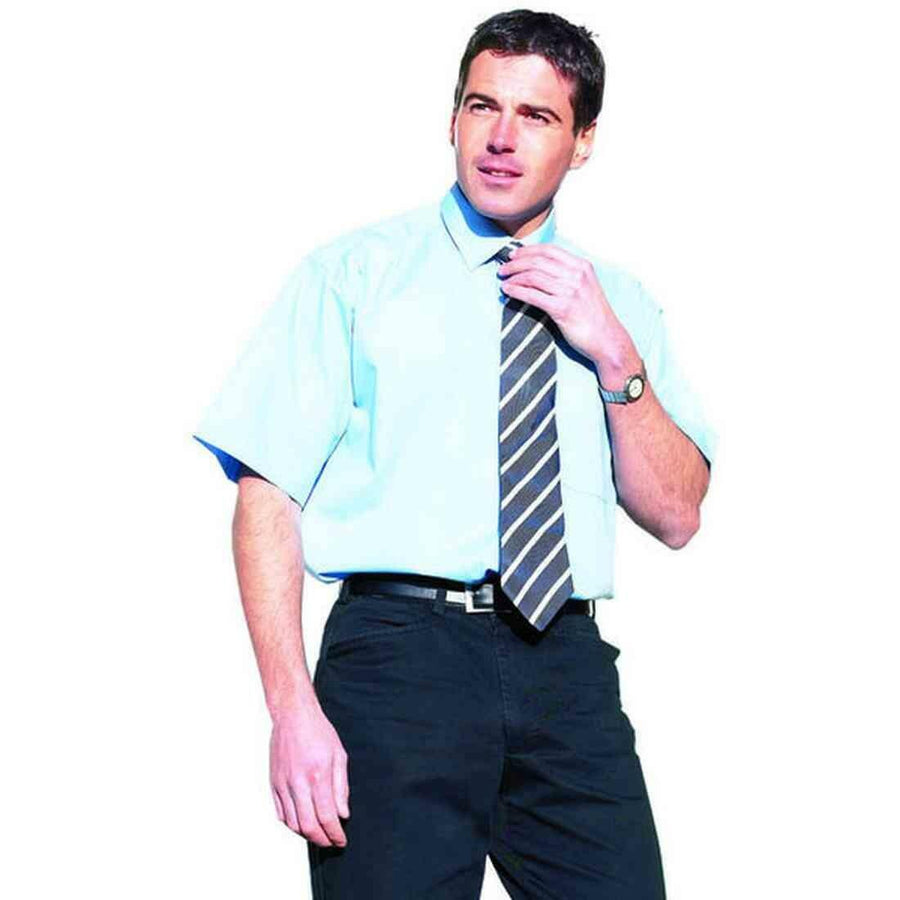 A man in business attire loosening his tie while looking thoughtful, isolated on a white background wearing Uneek's UC706.