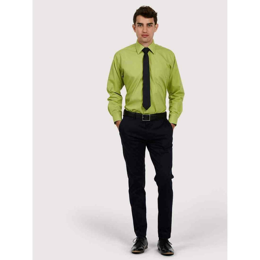 A man wearing a UC709 Lime Green Uneek poplin Long Sleeved shirt with Black trousers