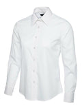 A white UC711 button-down dress shirt displayed on a white background, featuring a pointed collar and long sleeves.