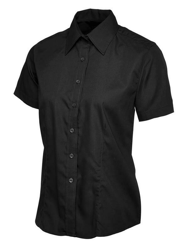 A black, button-up shirt with short sleeves and a pointed collar from Uneek (UC712), displayed on a plain white background.