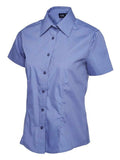 A mid blue, button-up shirt with short sleeves and a pointed collar from Uneek (UC712), displayed on a plain white background.