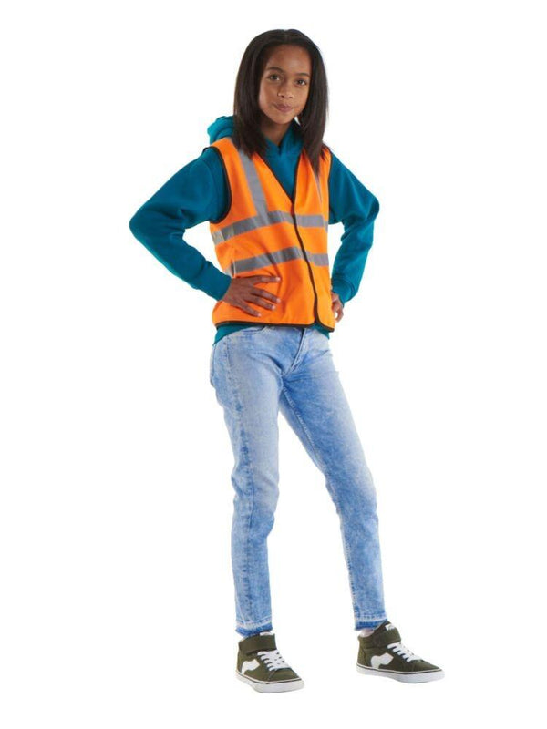 A young person wearing a blue hoodie and an Uneek orange reflective safety vest from The Stitch Factory stands with hands on hips, posing for the camera. They are also wearing blue jeans and green sneakers.
