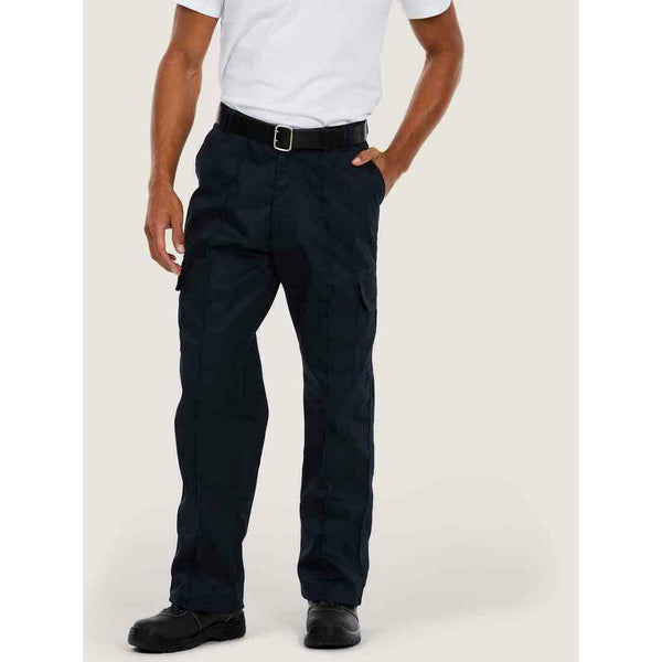 A man wearing a UC902 Navy Uneek cargo trousers