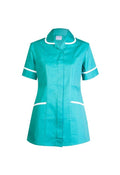 A Uneek short-sleeve ladies scrub tunic in emerald with white trim on collar, sleeves, and pockets, displayed on a white background.