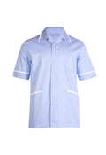 A Uneek UC924 mens heavyweight sky blue short-sleeve beauty and spa tunic with white trim around the collar and arms. It features a front button closure, a cross over neckline, and two front pockets outlined in white.