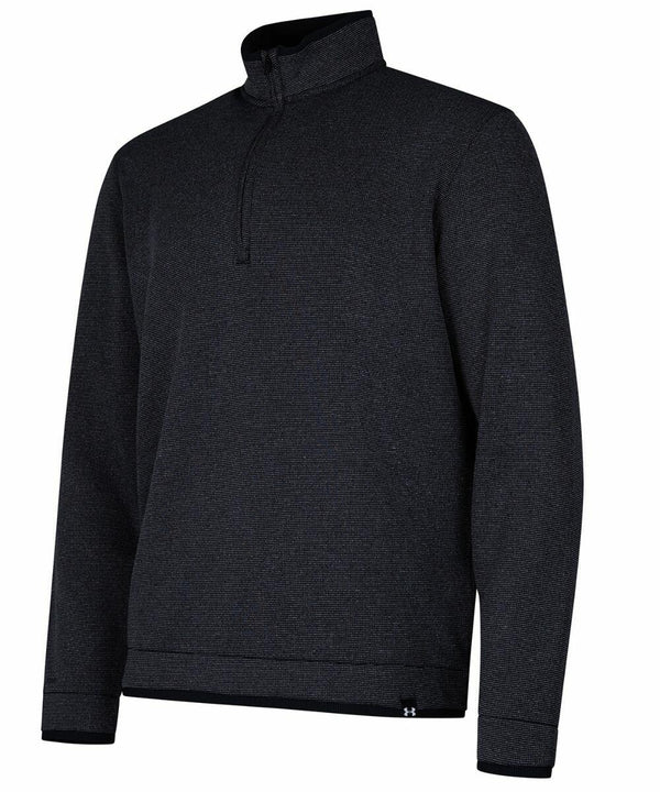 A black long-sleeve quarter-zip pullover with a stand-up collar and a small Under Armour Golf logo on the bottom hem, known as the UG031.