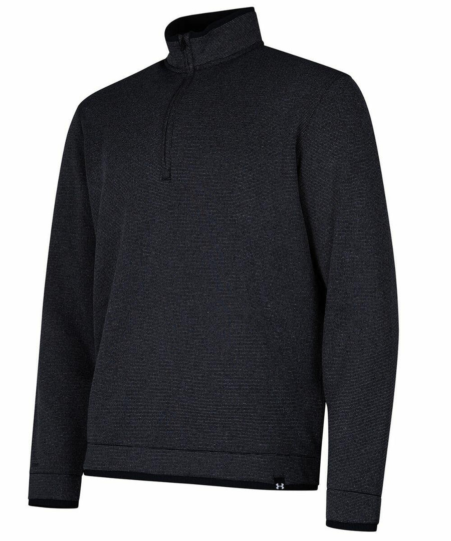 A black long-sleeve quarter-zip pullover with a stand-up collar and a small Under Armour Golf logo on the bottom hem, known as the UG031.