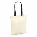 A plain canvas tote bag in beige featuring black handles, from Westford Mill, product W101C.