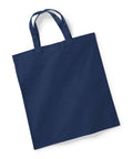 Westford Mill's navy blue tote bag, model W101S, featuring two handles, is set against a white background.