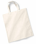 A plain, off-white canvas tote bag with two handles, lying flat against a white background. The product is named W101S and is made by Westford Mill.
