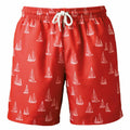 Wombat's WB900 swim trunks in red, showcasing a white drawstring and a pattern of small white sailboats.