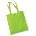 A Westford Mill WM101 tote bag in solid bright green, featuring two long handles, is displayed flat on a white background. The bag has a simple, unembellished design.