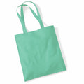 A WM101 tote bag by Westford Mill in turquoise, featuring two long handles, set against a white background.