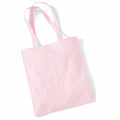 A light pink tote bag labeled as WM101 from Westford Mill, featuring long handles, is displayed flat on a white background. The fabric looks plain and smooth with no visible patterns or designs.