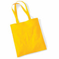 The Westford Mill WM101 is a vibrant yellow tote bag featuring two long handles, displayed flat against a white background. The material is smooth and unadorned.