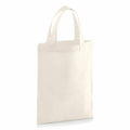 The Westford Mill WM103 is a plain white canvas tote bag featuring short handles and standing upright.