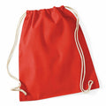 The WM110 by Westford Mill is a red drawstring bag crafted from fabric with beige rope handles on each side, shown empty against a plain white background.