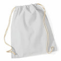 The WM110 drawstring bag from Westford Mill is shown in a plain light gray color, featuring beige-colored strings. The bag exhibits a slightly wrinkled texture, highlighting its fabric quality, and the drawstrings are arranged to create loops at the bottom corners.