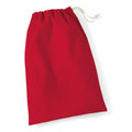 A Westford Mill WM115 red cloth drawstring bag displayed against a white background.