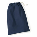 The Westford Mill WM115 bag, featuring a navy blue color and a light-colored drawstring, lies flat on a plain white background.