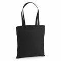 WM201 by Westford Mill is a black canvas tote bag featuring two handles, set against a white background.