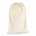 A Westford Mill WM216 beige drawstring bag with a gathered top.