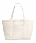 A WM255 by Westford Mill, featuring a beige fabric tote bag with a striped texture and two long handles.