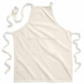 The WM364 apron by Westford Mill, featuring a plain white design with a central pocket and adjustable neck and waist ties, is showcased on a white background.