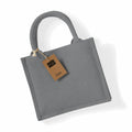 WM412 by Westford Mill: a gray jute tote bag featuring short handles and adorned with a brown tag.