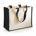 A Westford Mill WM422 canvas tote bag, designed with black handles and trim, and highlighted by a beige center panel.