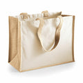 The Westford Mill WM422 is a beige canvas tote bag featuring jute handles and trim, designed to stand upright.