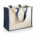 Introducing the Westford Mill WM422, a stylish reusable tote bag in beige and navy featuring a sturdy handle design. This rectangular-shaped accessory boasts a simple yet elegant aesthetic, perfect for shopping or carrying books.
