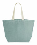 The WM466 by Westford Mill is a fabric tote bag in light blue with cream-colored handles, displayed against a white background.