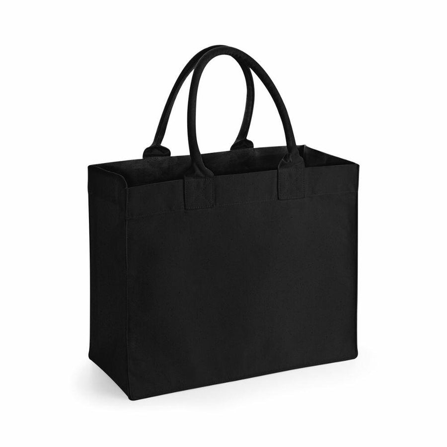 A Westford Mill WM608 plain black tote bag with dual handles, set against a white background.