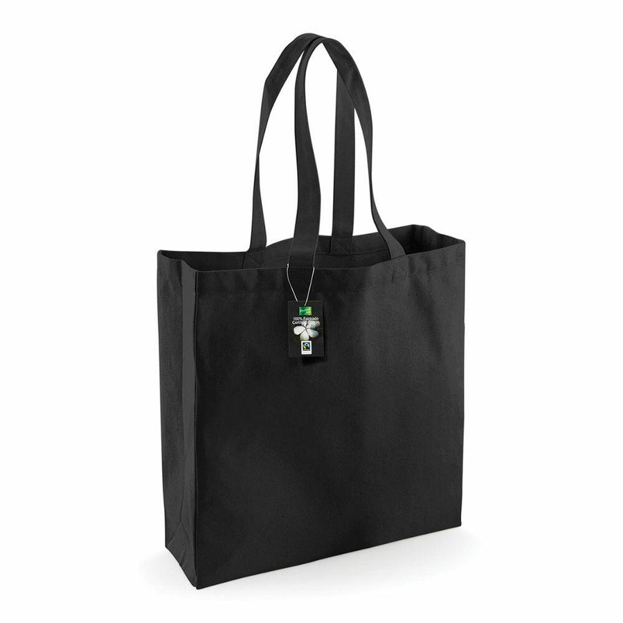Westford Mill's WM623 black tote bag, featuring two handles and a small tag near the top.