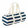 Introducing the WM688 by Westford Mill: a cylindrical duffel bag featuring navy and white horizontal stripes, complemented by cream-colored handles and a zippered top.